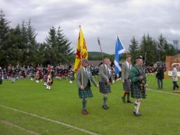 The Chieftain, Robin MacLennan, arrives in style to open Dufftown Highland Games. Dufftown, Moray, Scotland, UK.
